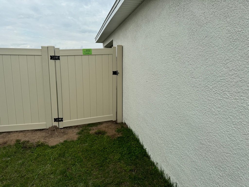 North River Fence Completes Premier Residential Installation of 60 Feet of 6-Foot High Tan PVC Privacy Fence in Bella Lago Community