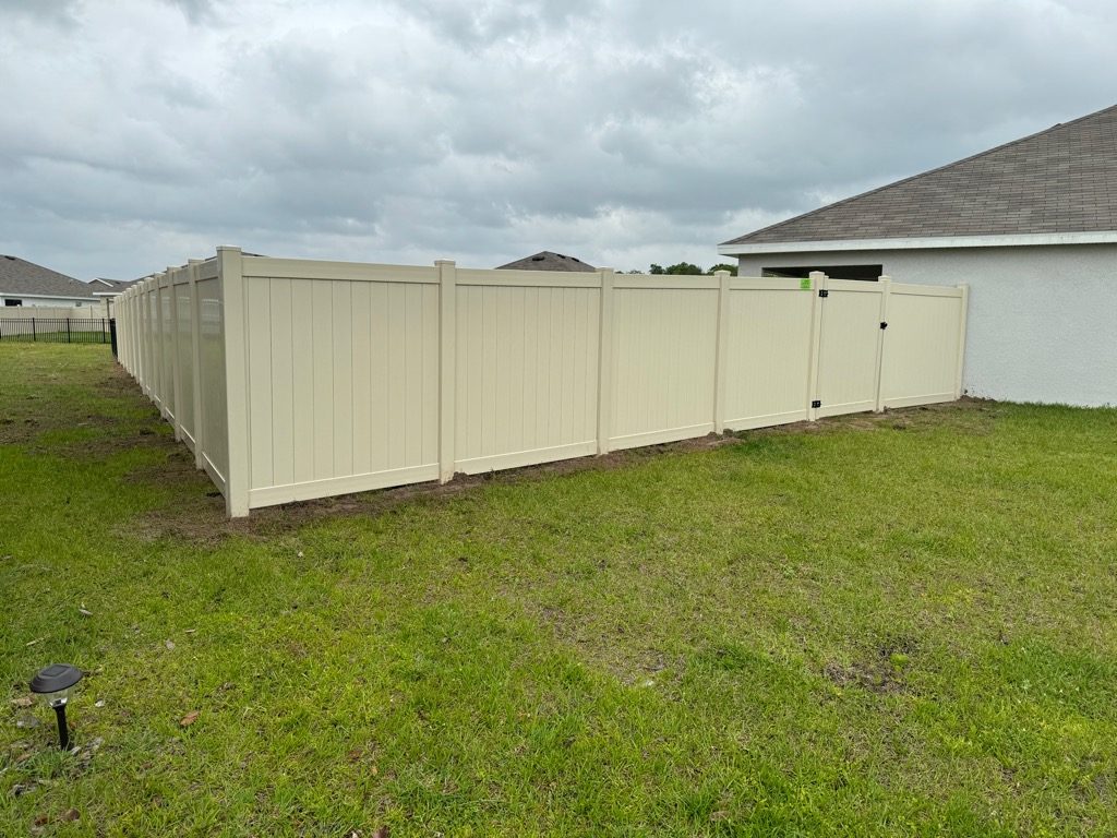 North River Fence Completes Premier Residential Installation of 210 Feet of 6-Foot High Tan PVC Privacy Fence and 54 Feet of 4-Foot High Black Aluminum 3-Rail Fence in Bella Lago Community